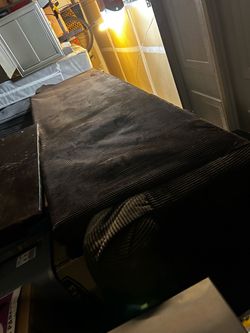 Brown 9ft couch and matching love seat with all cushions and pillows