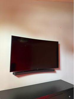 55 inch curve TV with curve sound bar.