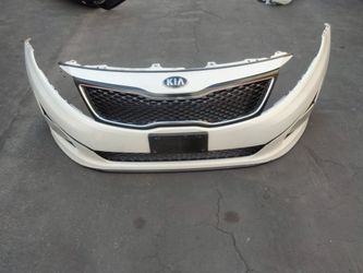2013-2015 Kia Optima complete front bumper with all the accessories and inner fillers with accessories OEM.