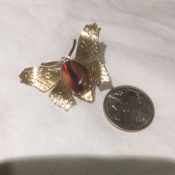 Gold butterfly pin