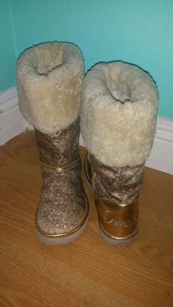 Coach authentic gold nikole boots..size 7...great condition#...cost over $200