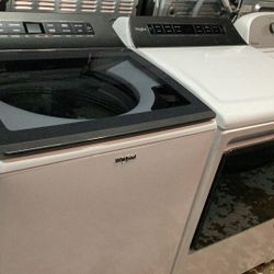 Whirlpool 5.2 - 5.3 cu. ft. Top Load Washer and Whirlpool - 7.4 Cu. Ft. Smart Electric Dryer with Steam and Advanced Moisture Sensing - in White.