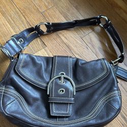 Brown leather coach bag