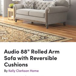 Rolled Arm Sofa With Reversible Cushions 