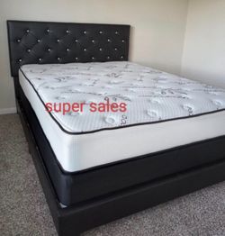 New queen size bed with mattress and boxspring