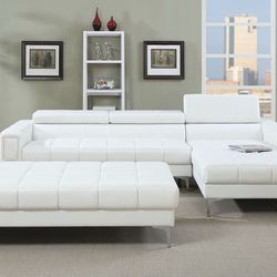 White leatherette sectional WTH ottoman