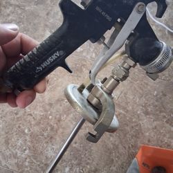 Spay Gun And Saw Saw