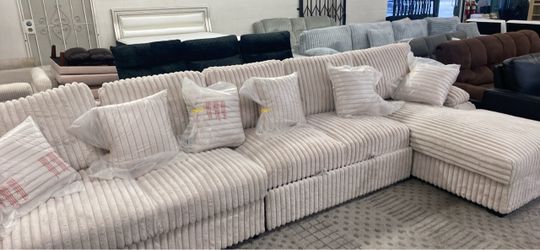 New X-Large sleeper sectional couch with storage / free delivery