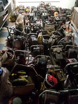 Many vintage saws and saw parts. Some saws whole, many partial. Boxes and boxes of more parts. Many makes and models.