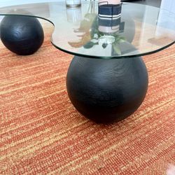 Modern Glass Coffee Table with Sculptural Wood Bases