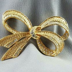 Brooch Bow Roman Dimpled Gold Pave. 