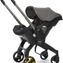 Doona Infant Car Seat/ Compact Stroller System With Base