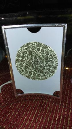 Beautiful abstract art in glass frame 15$each or will give a bundle price of 45$