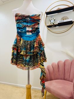 New with tag, Outcast Clothing multicolored zebra print mini dress with ruffles, size XS