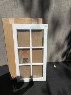 Two 22 x 41 6-pane vinyl windows