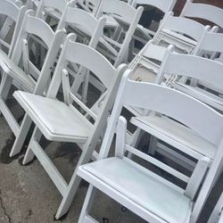 White RESIN folding Chairs