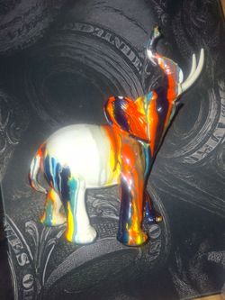 Colorful Elephant Figurine with Drip Paint Design