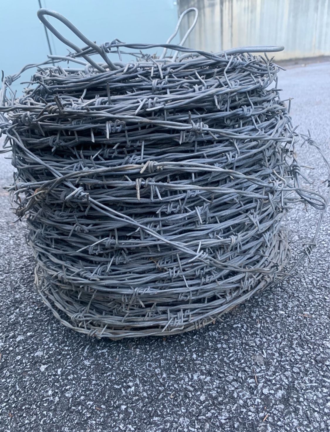 Â 4-Point Barbed Wire Roll w/ 5" Coil Spacing