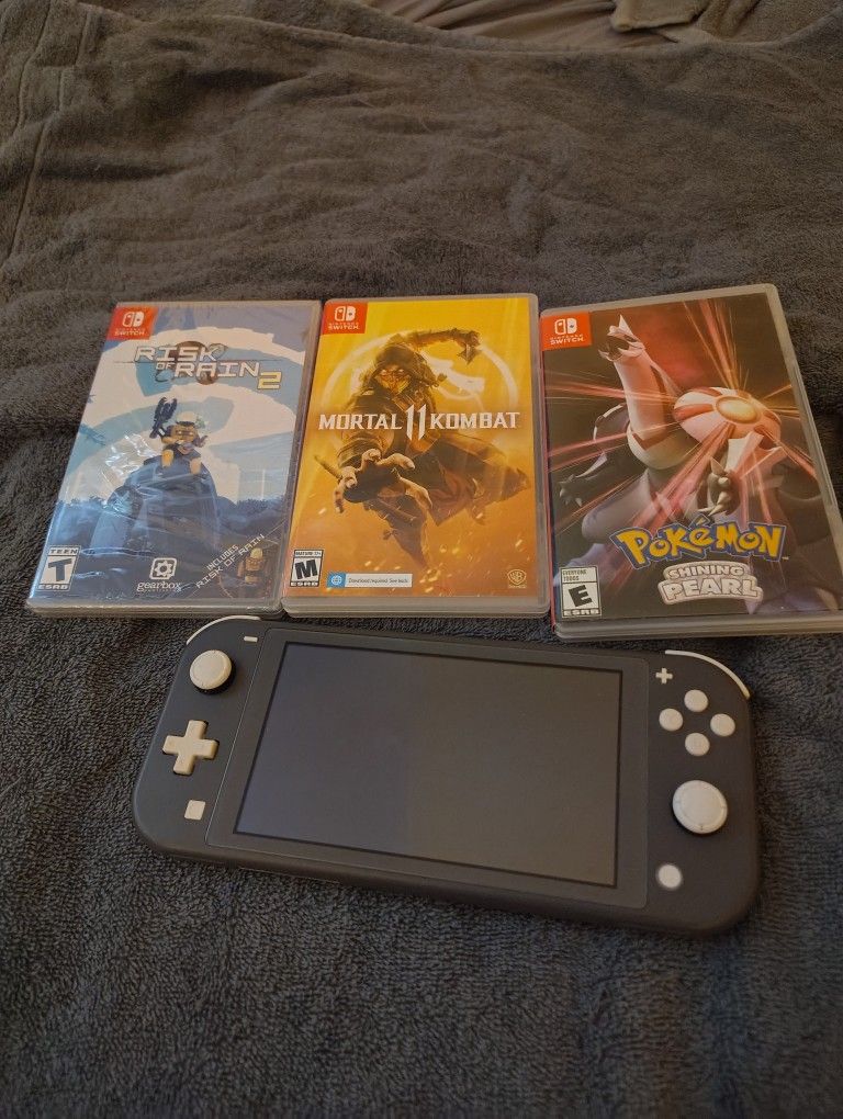 Nintendo Switch Lite And Games Bundle
