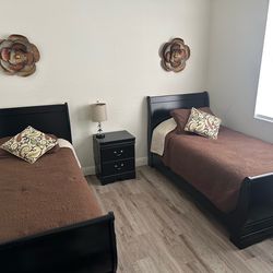 Selling Bedroom Set (two beds, mattresses, dresser, nightstand, mirror, wall decor)