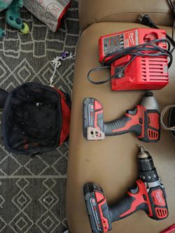 Milwaukee driller/driver & impact driver M18+ charger $160