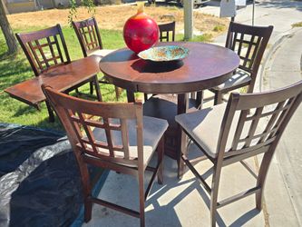 Extendable wood dinner table and chairs: best offer