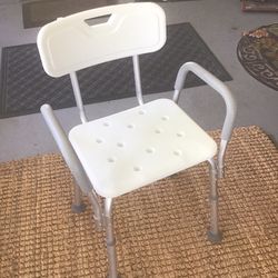 GUARDIAN ADJUSTABLE  SHOWER CHAIR WITH BACK AND  PADDED ARM . LIKE NEW 