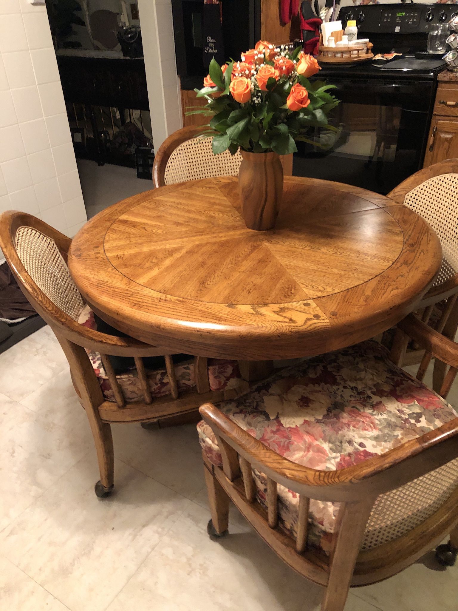 Really Nice Dining Table with 4 Chairs On Wheels and New Cane Backing