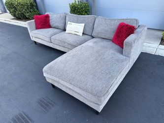 Perfect size gray living spaces sectional couch !!