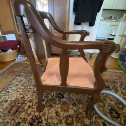 REDUCED  antique carved lion head chairs. One is a rocker.