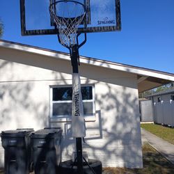 Spalding 60 inch Acrylic Screw Jack Portable Basketball Hoop System