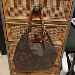 Michael Kors Zippered and Snap Closure