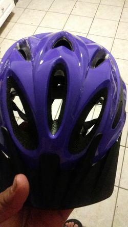 purple bicycle helmet with the back part in new yellow