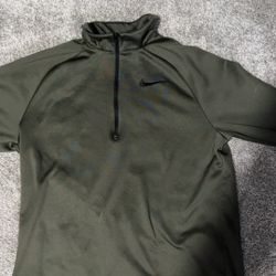 Nike dark green quarter zip jacket.