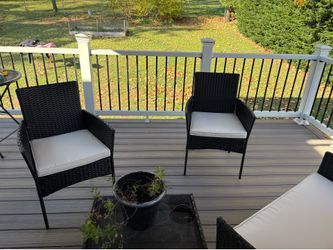 Outdoor patio set ( sofa-two chairs - small table with cushions )