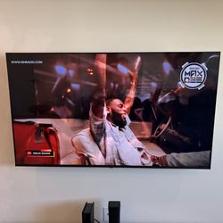 65 in Wall mounted TV and modern gray media console