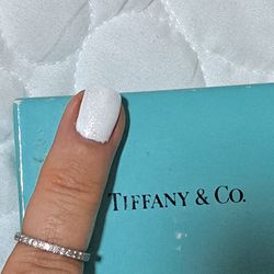 EXCELLENT AUTHENTIC " TIFFANY & CO.  PLATINUM FULL CIRCLE DIAMONDS RING  550$