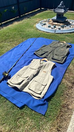 Fishing Pole with a Penn Reel & vests