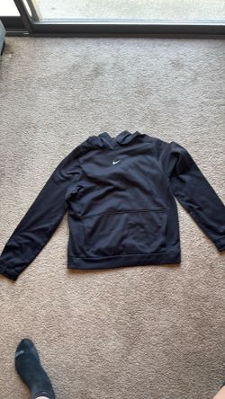 It a XL in kids and a black color Nike