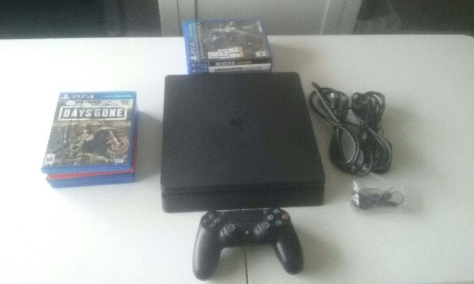 PS4 Slim 500GB Console with 9 games