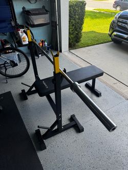 Weight bench and Olympic bar