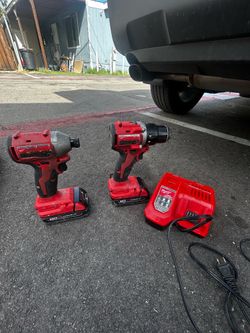 Milwaukee drill and impact with rapid charger