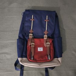 Herschel Little America Backpack in the Navy/Red/Tan colorway.