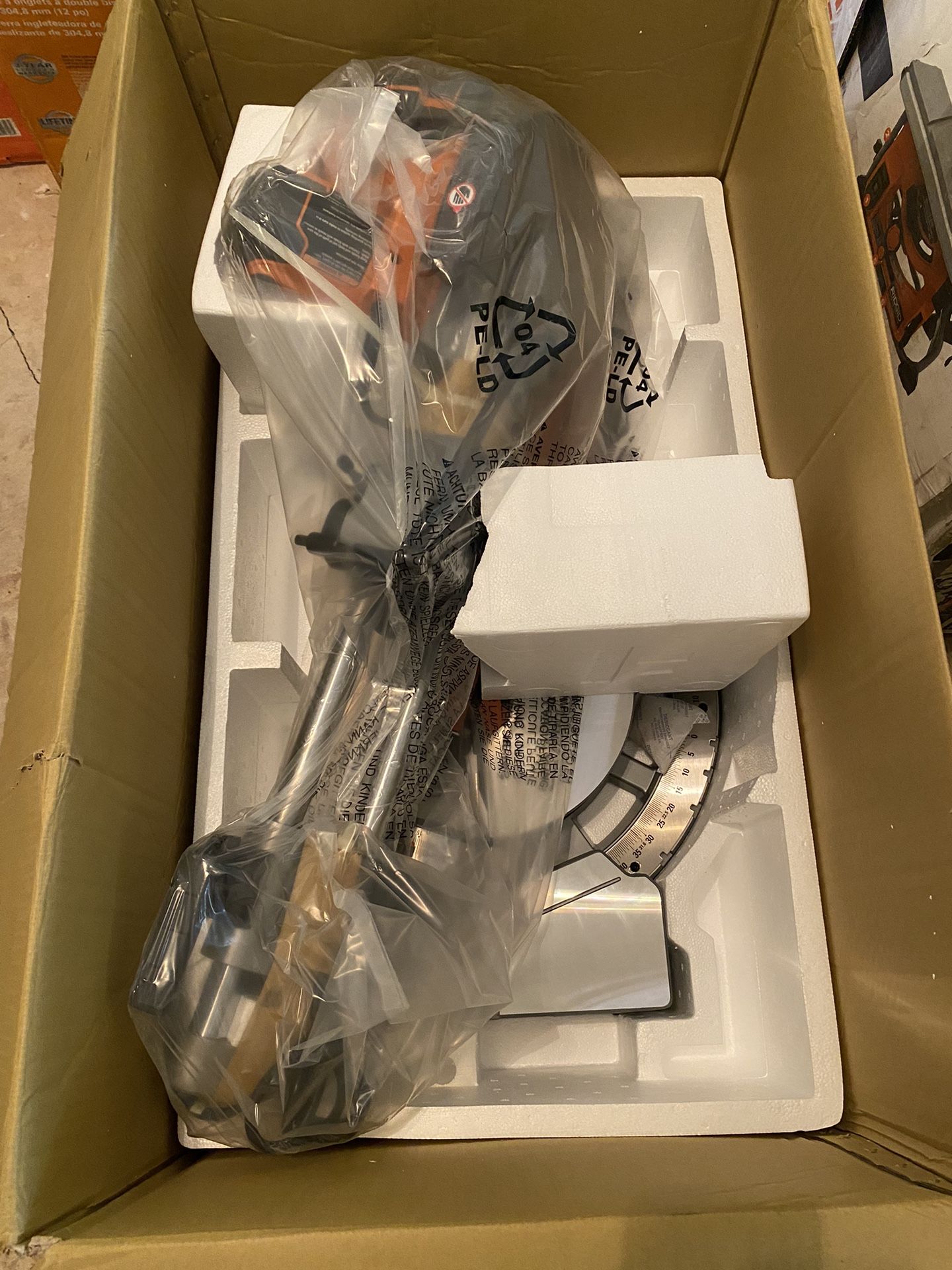 BRAND NEW RIDGID 12in Dual Bevel Sliding Miter Saw never out of the box