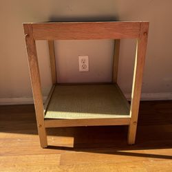 Nathan James 33301 Hayes solid wood nightstand in a light brown wood finish with a glass