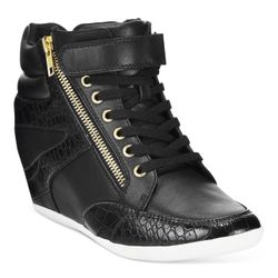 Update your casual look with the street-chic wedge and gold-tone accents of Thalia Sodi's Azar high-tops for eye-catching style.  • Round closed-toe l