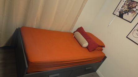 Twin bed with storage drawers