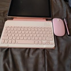 Pink Tablet With Keyboard And Mouse And A Stylus Pen 