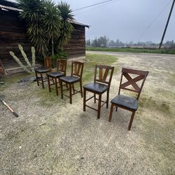 5 Wooden Hi chairs  30$