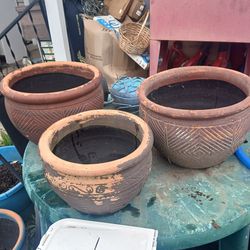 3 of them pottery flower pots